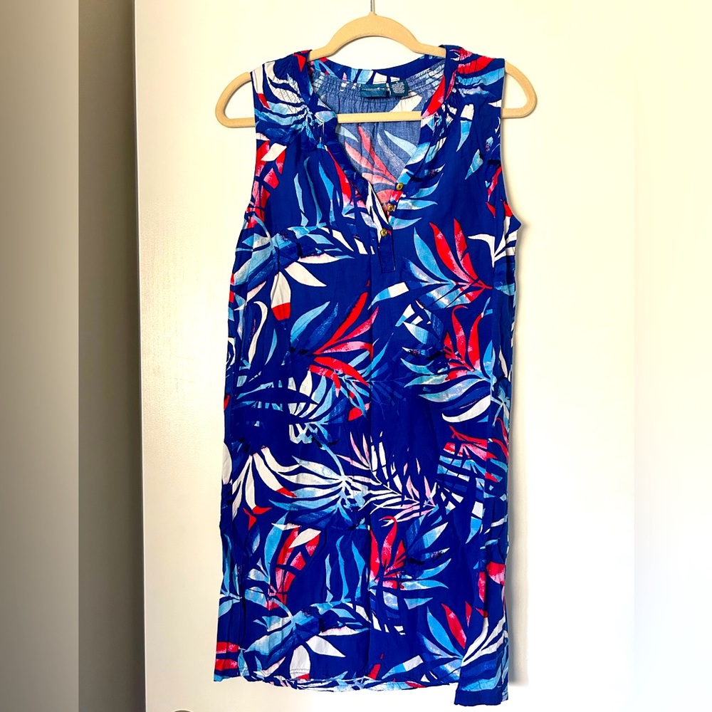 Sleeveless dress, red, white and blue. Sits just above the knee.